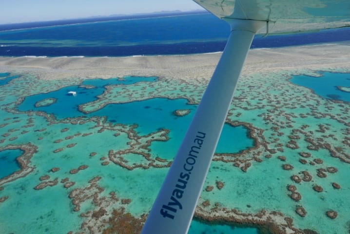 Whitsundays Scenic flight looking at heart reef 